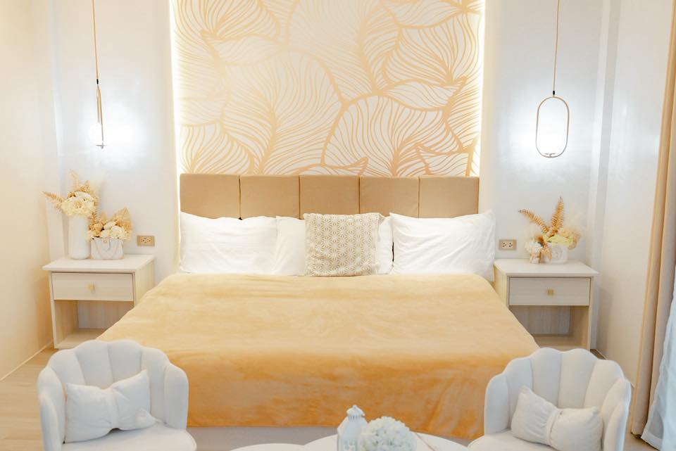 Master bedroom with golden accents
